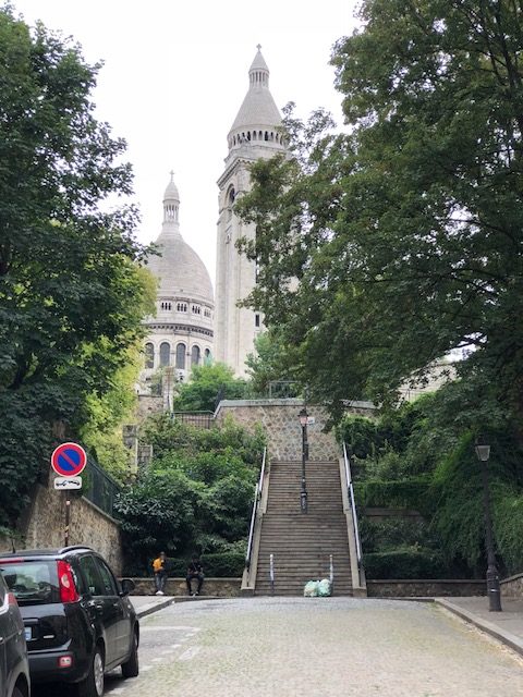 Back of the Sacre Coeur, with sidewalk steps to get there 