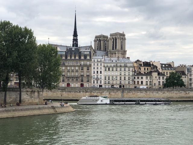 My first encounter with the Seine River, with Notre Dame across the way 