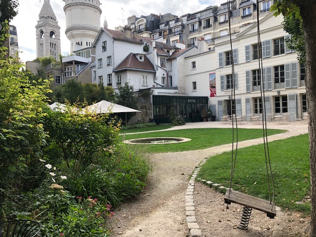The garden, and a swing which appears in one of Renior's paintings 