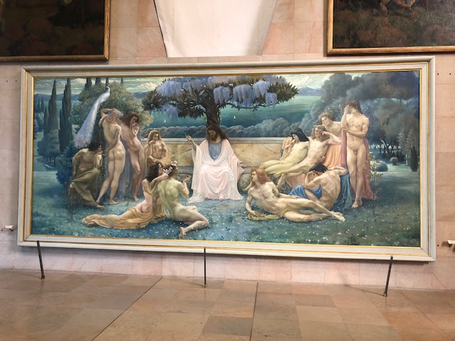 A large painting in the symbolism section: a Christ-like teacher in the center, lots of nude people around him, mixed genders