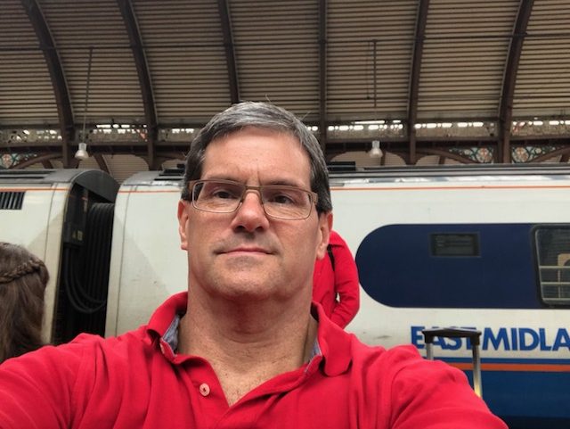 Selfie sitting on the train platform 