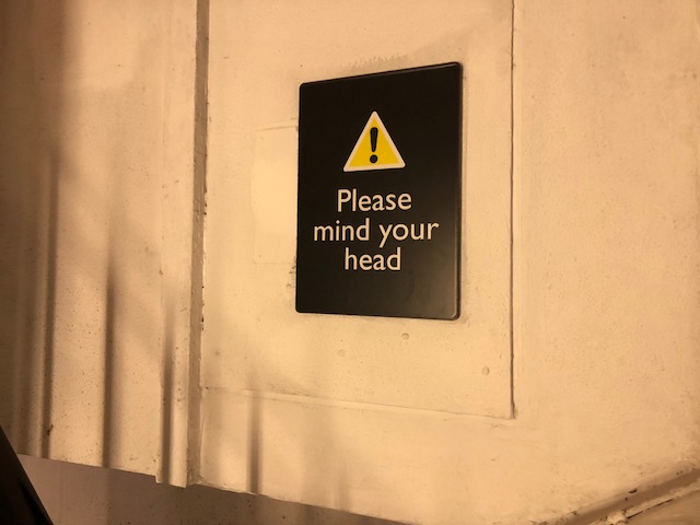 Sign that says "Mind your head"