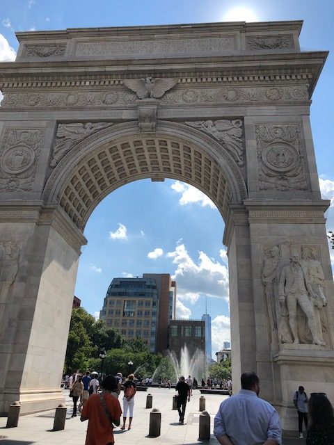The arc in Washington Square, with the new World Trade Center in the background 
