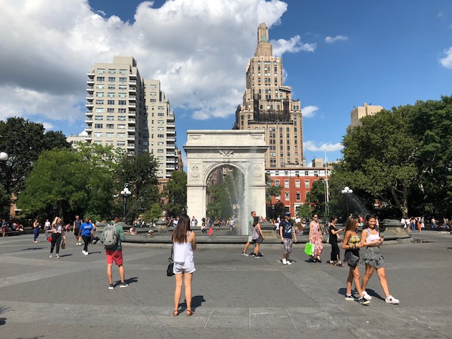 The fountain in Washington Square with the arc behind it