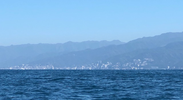 The city of Puerto Vallarta against the mountains across the bay 