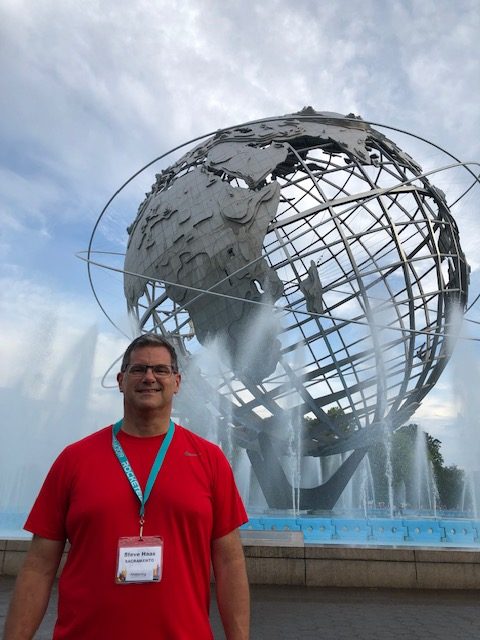 Me at the Unishpere - a huge hollow globe sculpture in an even bigger water fountain