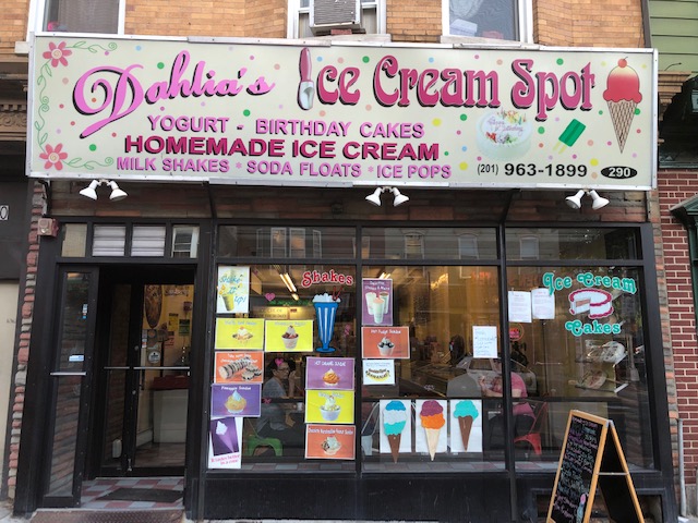 Sign over a shop: Dahlia's Ice Cream Spot - homemade ice cream, birthday cakes, milk shakes, soda floats, ice pops