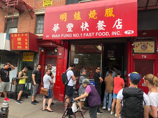Sign above restaurant: #1 Wah Fung No. 1 Fast Food, Inc