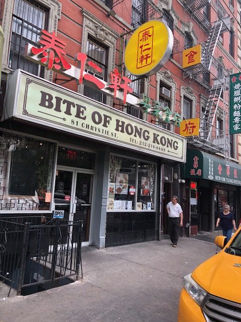 Sign above restaurant: Bite of Hong Kong