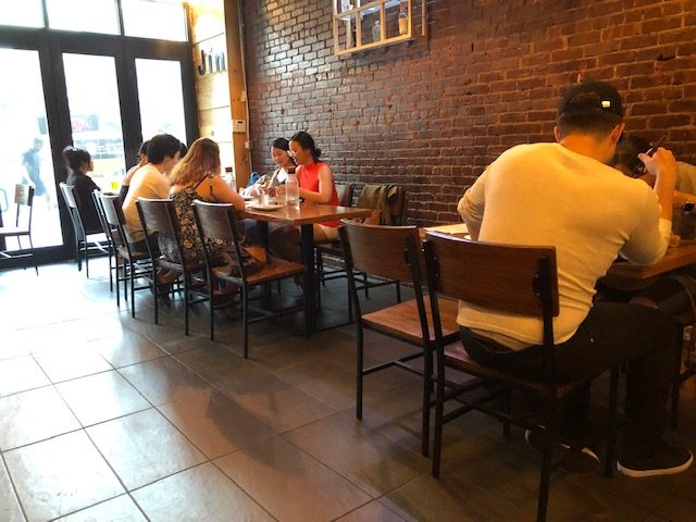 Photo of Korean customers at tables