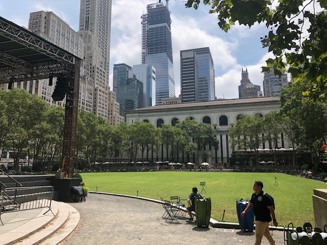Lawn of Bryant Park, with the end of a stage to the left
