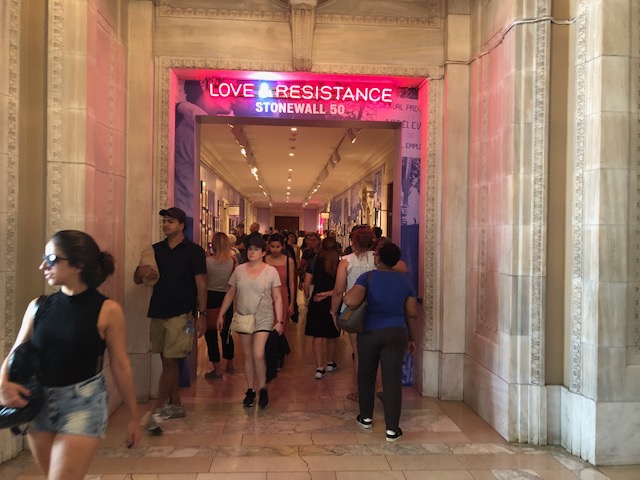 Sign aboe door entering a hallway: Love & Resistancce, Stonewall 50