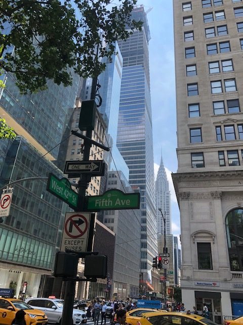 Intersection of Fifth Ave and 42nd St, with the Chrysler building in the background