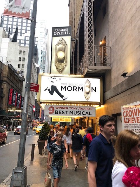 Book of Mormon marquee from the sidewalk