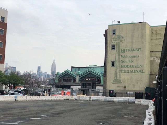 Hoboken train terminal, with the Empire State Building in the background