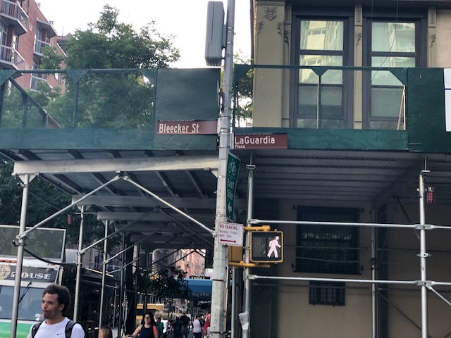 Street sign of intersection of Bleecker and LaGuardia