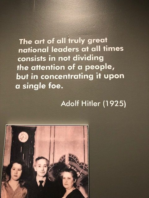 Quote on the wall: The art of all truly great national leaders at all times consists in not dividing the attention of people, but in concentrating it upon a single foe. Adolf Hitler, 1925
