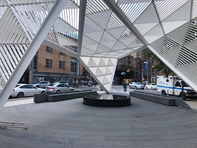 A white sculptured canopy at the NYC AIDS Memorial