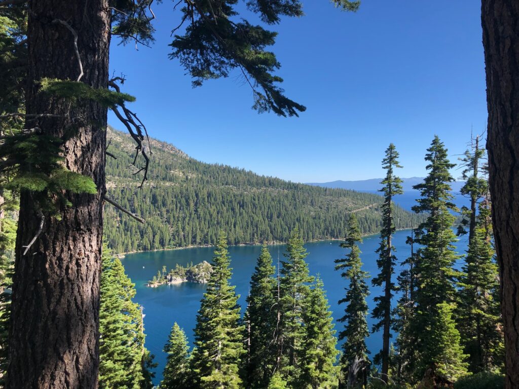 Southwest view of Emerald Bay from Inspiration Point, lots of trees in front