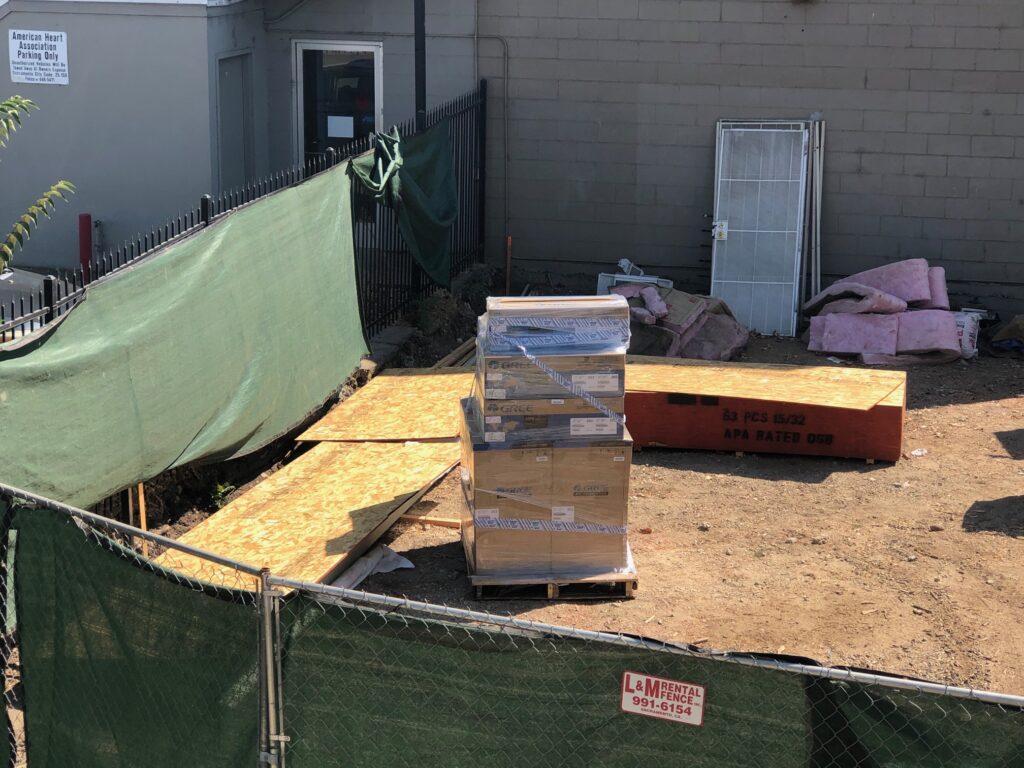 new HVAC systems delivered on a palette, 9 boxes wrapped in plastic