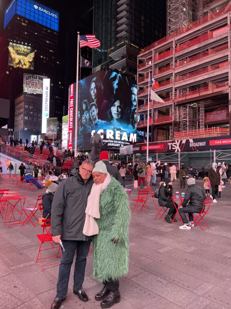 Photo of me and Del'Esa at the center of Times Square 