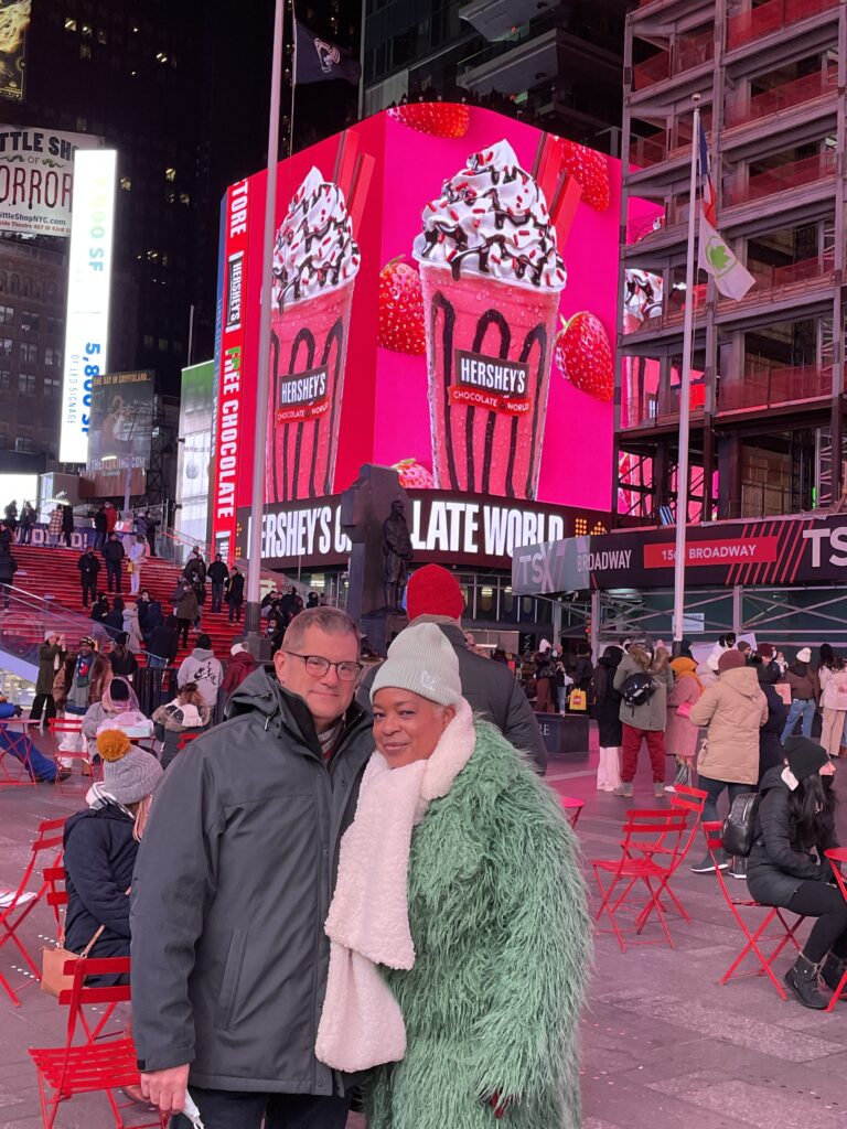 Photo of me and Del'Esa at the center of Times Square 