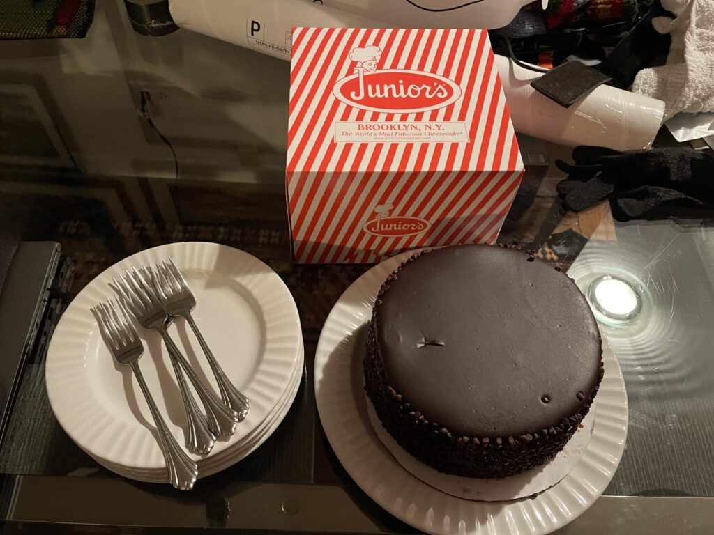 the complete cake alongside the Junior's box 