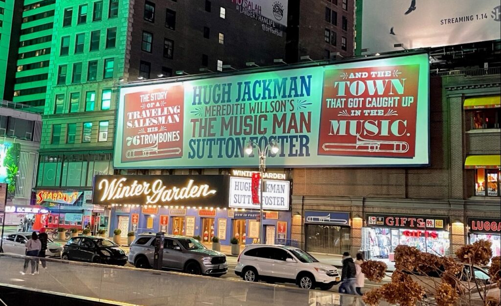 Huge billboard above the marquee of the Winter Garden theater advertising The Music Man. 