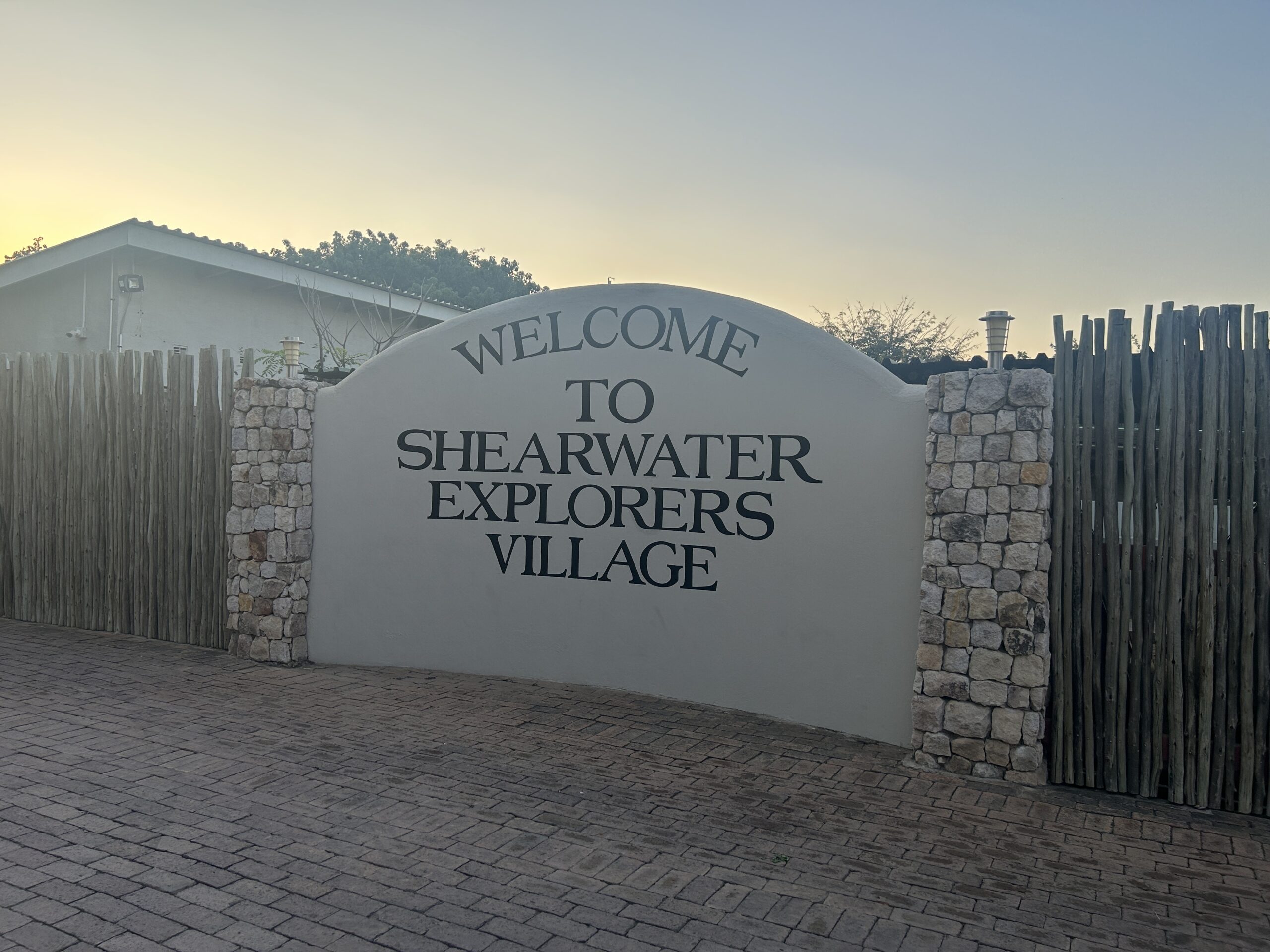 Sign: Welcome to Shearwater Explorers Village 